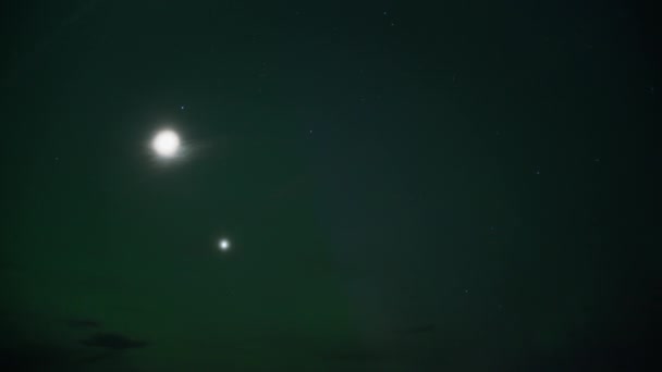 北极光在月亮和金星旁边的夜空中闪耀 时间流逝 — 图库视频影像