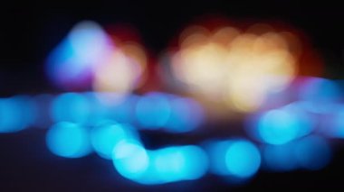 Bulanık ışıklandırılmış renkli bokeh yuvarlak ışıklar arka plan. 