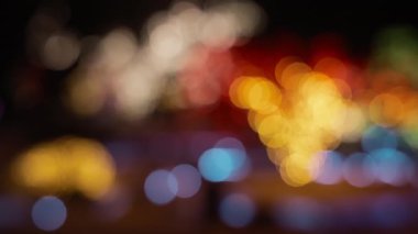 Renkli şenlik bokeh yuvarlak ışıkları bulanıklaştırdı. Soyut arkaplan. 