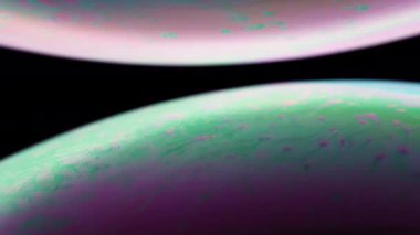 Siyah arkaplanda hareket eden iki renkli sıvı küre. Soyut makro kavramsal arkaplan. 