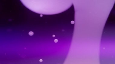 Soyut lav kabarcıkları mor bir zemin üzerinde sıvı içinde yüzerler. Yavaş çekim. 