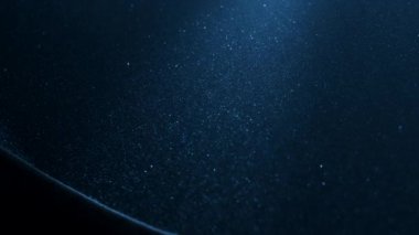 Küçük toz tanecikleri yavaş çekimde parıldayan parçacıklar. 