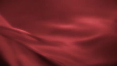 Rüzgarda uçuşan kırmızı şifonlu dalgalı kumaş. Yavaş çekim. 