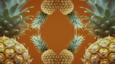 Turuncu arkaplanda soyut ananas deseni.