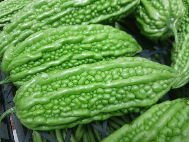 Çin acı kavunu sebzesi. Sağlıklı besleyici çiğ yemek, sert kavun. Çin yeşil kavunu sebzesi.. 