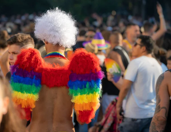 stock image Gay pride demonstration in Madrid, during the summer of 2022, with a sunny day, lesbians, bisexuals, LGTBI, thousands of people demonstrating in the streets.