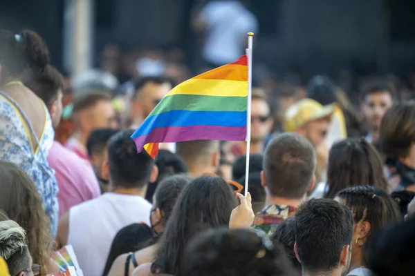 stock image Gay pride demonstration in Madrid, during the summer of 2022, with a sunny day, lesbians, bisexuals, LGTBI, thousands of people demonstrating in the streets.