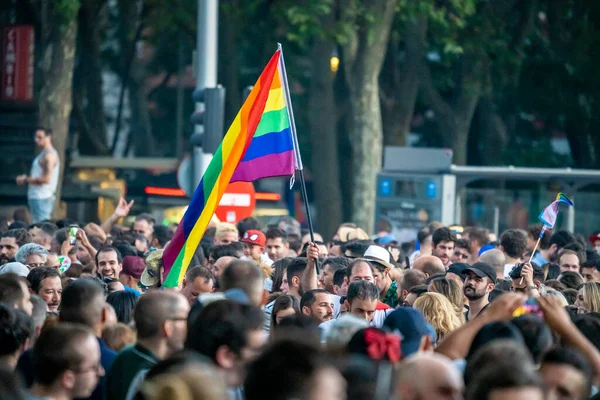 stock image Gay pride demonstration in Madrid, during the summer of 2022, with a sunny day, lesbians, bisexuals, LGTBI, thousands of people demonstrating in the streets.