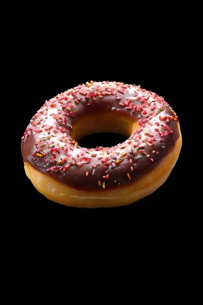 Donut Mit Streusel Auf Schwarzem Hintergrund — Stockfoto