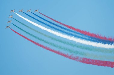 PAYERNE, SWITZERLAND - SEPTEMBER 6: Flight of Al Fursan aerobatic team from UAE in close formation on AIR14 airshow in Payerne, Switzerland on September 6, 2014