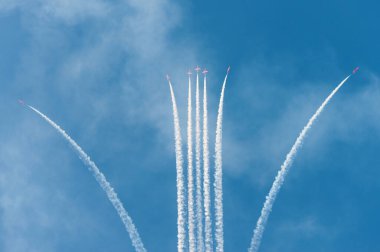 PAYERNE, SWITZERLAND - SEPTEMBER 6: Show of RAF Red Arrows aerobatic team on AIR14 airshow in Payerne, Switzerland on September 6, 2014