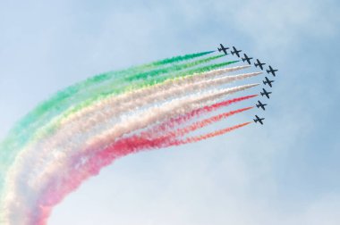PAYERNE, SWITZERLAND - SEPTEMBER 6: Flight of Italian aerobatic team Frecce Tricolori on AIR14 airshow in Payerne, Switzerland on September 6, 2014