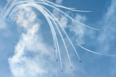 PAYERNE, SWITZERLAND - SEPTEMBER 6: Flight of Italian aerobatic team Frecce Tricolori on AIR14 airshow in Payerne, Switzerland on September 6, 2014