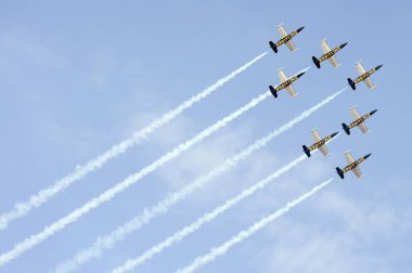 PAYERNE, SWITZERLAND - SEPTEMBER 7: Flight of Breitling Jet Team in close formation on AIR14 airshow in Payerne, Switzerland on September 7, 2014