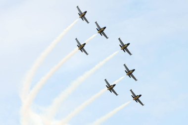 PAYERNE, SWITZERLAND - SEPTEMBER 7: Flight of Breitling Jet Team in close formation on AIR14 airshow in Payerne, Switzerland on September 7, 2014