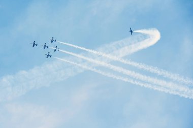 PAYERNE, SWITZERLAND - SEPTEMBER 7: Flight of Breitling Jet Team in close formation on AIR14 airshow in Payerne, Switzerland on September 7, 2014