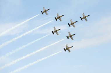 PAYERNE, SWITZERLAND - SEPTEMBER 7: Flight of Breitling Jet Team in close formation on AIR14 airshow in Payerne, Switzerland on September 7, 2014