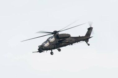 PAYERNE, SWITZERLAND - SEPTEMBER 7: Dynamic display of Agusta A-129 Mongoose on AIR14 airshow in Payerne, Switzerland on September 7, 2014