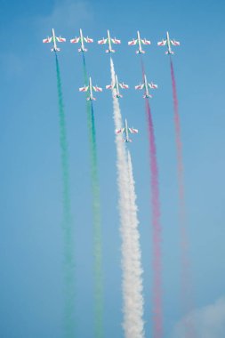 PAYERNE, SWITZERLAND - SEPTEMBER 7: Flight of Italian aerobatic team Frecce Tricolori in close formation on AIR14 airshow in Payerne, Switzerland on September 7, 2014