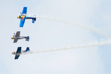 SLIAC, SLOVAKIA - AUGUST 30: The flying bulls aerobatics team from Czech republic performs flight maneuver on the SIAF airshow in Sliac, Slovakia on August 30, 2014