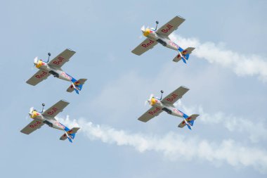 SLIAC, SLOVAKIA - AUGUST 30: The flying bulls aerobatics team from Czech republic performs flight maneuver on the SIAF airshow in Sliac, Slovakia on August 30, 2014