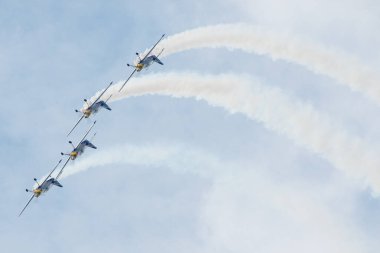SLIAC, SLOVAKIA - AUGUST 30: The flying bulls aerobatics team from Czech republic performs flight maneuver on the SIAF airshow in Sliac, Slovakia on August 30, 2014