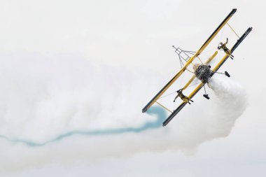 SLIAC, SLOVAKIA - AUGUST 30: Performance of Scandinavian Airshow team on GRUMMAN G-164A plane during SIAF airshow in Sliac, Slovakia on August 30, 2014