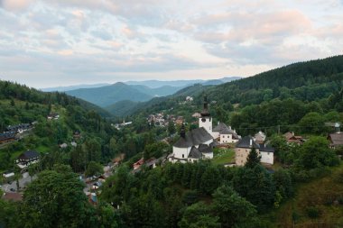 Historical church in the center of old mining village - Spania Dolina, Slovakia