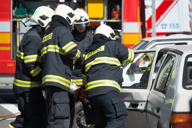 PEZINOK, SLOVAKIA - MAY 4, 2014: Search and rescue operation during simulated car accident in Pezinok, Slovakia