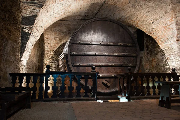 giant wine barrel in a cellar 