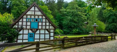 Traditional small house with beautiful outdoor decor facade in Germany. German old brick building house ancient European city German architect. High quality photo