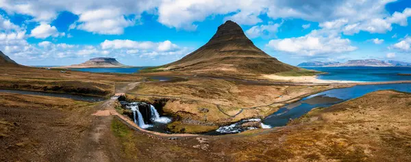 stock image Stunning aerial view of Kirkjufell Mountain in Iceland with cascading waterfalls and scenic coastal landscape.