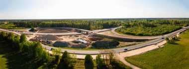 Letonya 'nın Kekava Bypass karayolu inşaatı. A7 Riga Bauska yolunun yeni bölümü ve Baltica 'daki uluslararası yolun bir bölümü