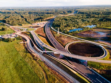 Letonya 'nın Kekava Bypass karayolu inşaatı. A7 Riga Bauska yolunun yeni bölümü ve Baltica 'daki uluslararası yolun bir bölümü