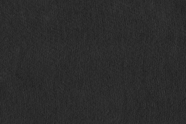 Arkaplan için siyah doku. Siyah kağıdı kapat. Renkleri süsle. Siyah ve soluk beyaz.