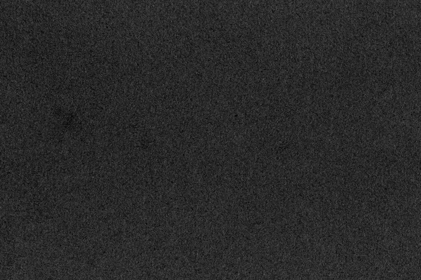 Stock image black texture for background. close up black paper embellishing colors dark black and faded white