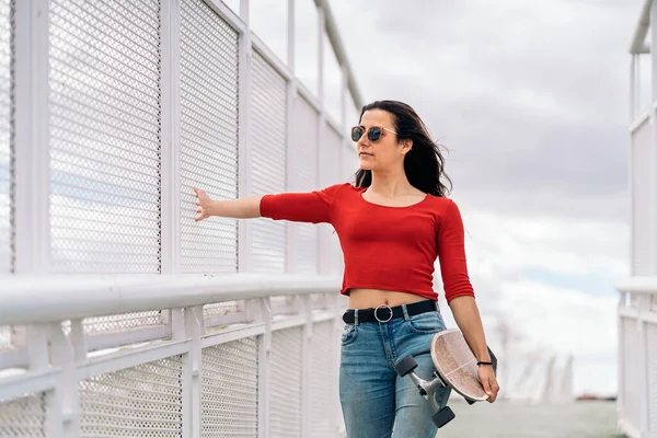 Casual Young Woman Sunglasses Walking City Holding Her Longboard — Stock Photo, Image