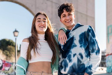 Stock photo of cool young dancing crew posing and looking at camera.