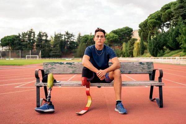 Stock Photo Disabled Man Athlete Sitting Bench Looking Camera — Foto de Stock