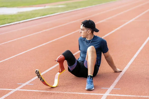 Stock Photo Disabled Man Athlete Taking Break Paralympic Sport Concept Stock Image