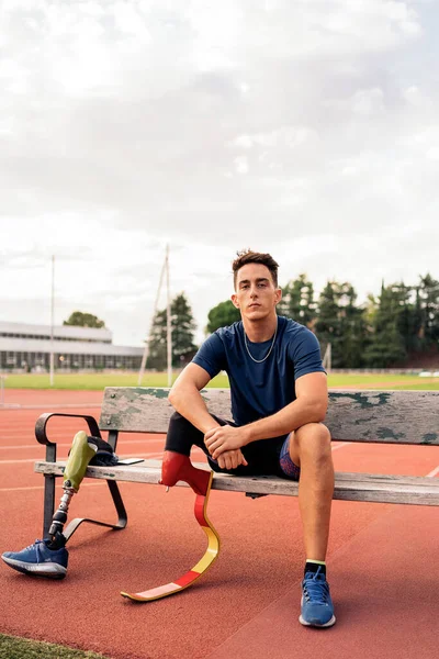 Stock Photo Disabled Man Athlete Sitting Bench Looking Camera Stock Picture