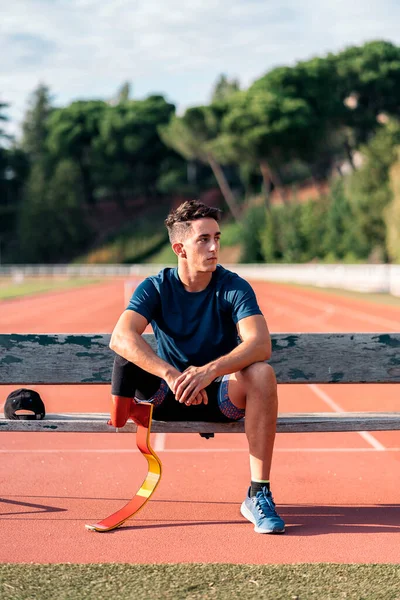 Stock Photo Disabled Man Athlete Sitting Bench Looking Camera Imagens Royalty-Free