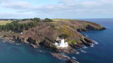 St Antony lighthouse cornwall england uk from the air drone aerial 