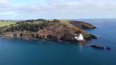St Antony lighthouse cornwall england uk from the air drone aerial 