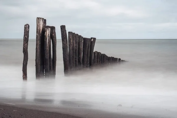 Dřevěné Groynes Porlock Beach Somerset England Pomalé Expozice — Stock fotografie