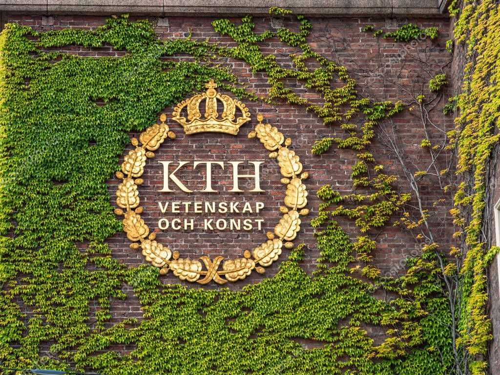 Stockholm, Sweden - June 7, 2025: A brick wall covered with green ivy features a golden emblem with a crown and the text 'KTH VETENSKAP OCH KONST.' which means Royal faculty for science and art