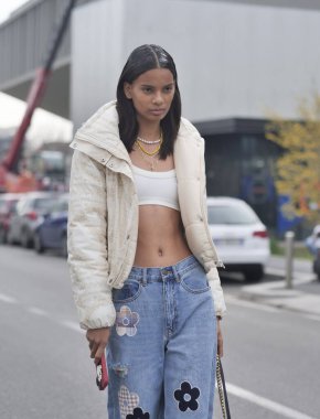 Model street style outfit after Prada fashion show during Milano fashionweek man collections 2022