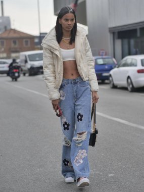 Model street style outfit after Prada fashion show during Milano fashionweek man collections 2022