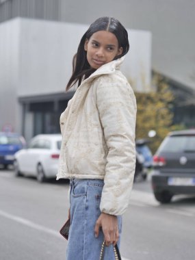 Model street style outfit after Prada fashion show during Milano fashionweek man collections 2022