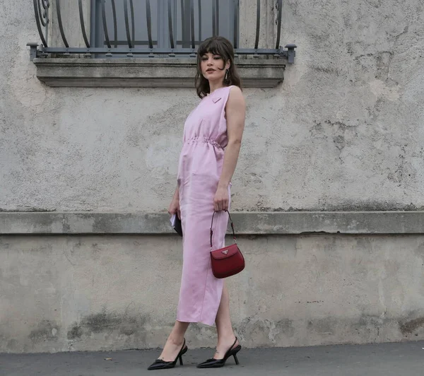 Model street style outfit after Prada fashion show during Milano fashionweek man collections 2022